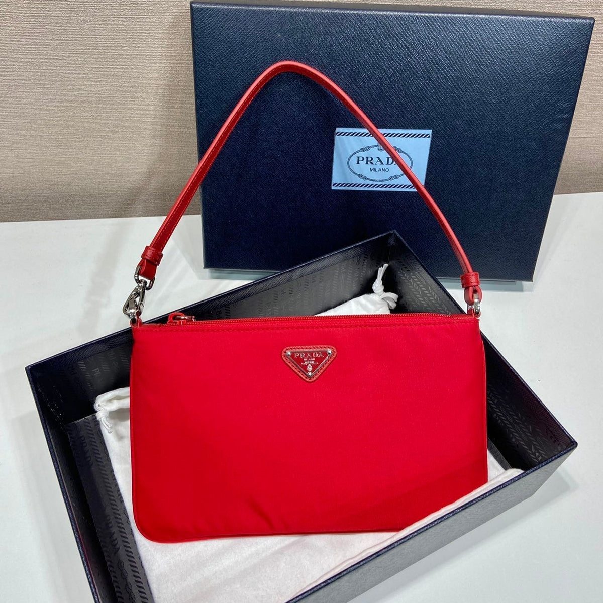 PRADA SHOULDER BAG 24 WITH TRIANGLE LOGO IN PASSION RED RE-NYLON FABRIC